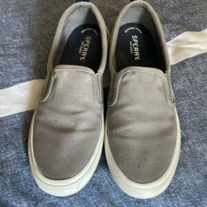 Sperry slip on sneakers not only fashionable but in great condition too!